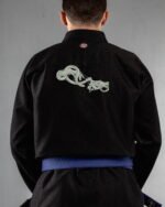 Skeleton Hands & Snake embroidery on the back of a black BJJ Gi