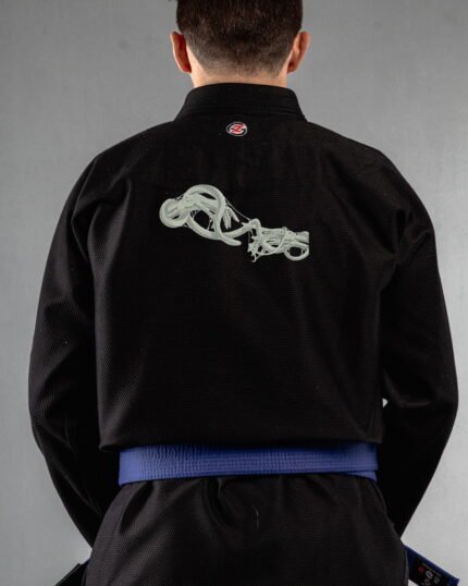 Skeleton Hands & Snake embroidery on the back of a black BJJ Gi