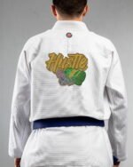 Hustle embroidery on the back of a white BJJ Gi