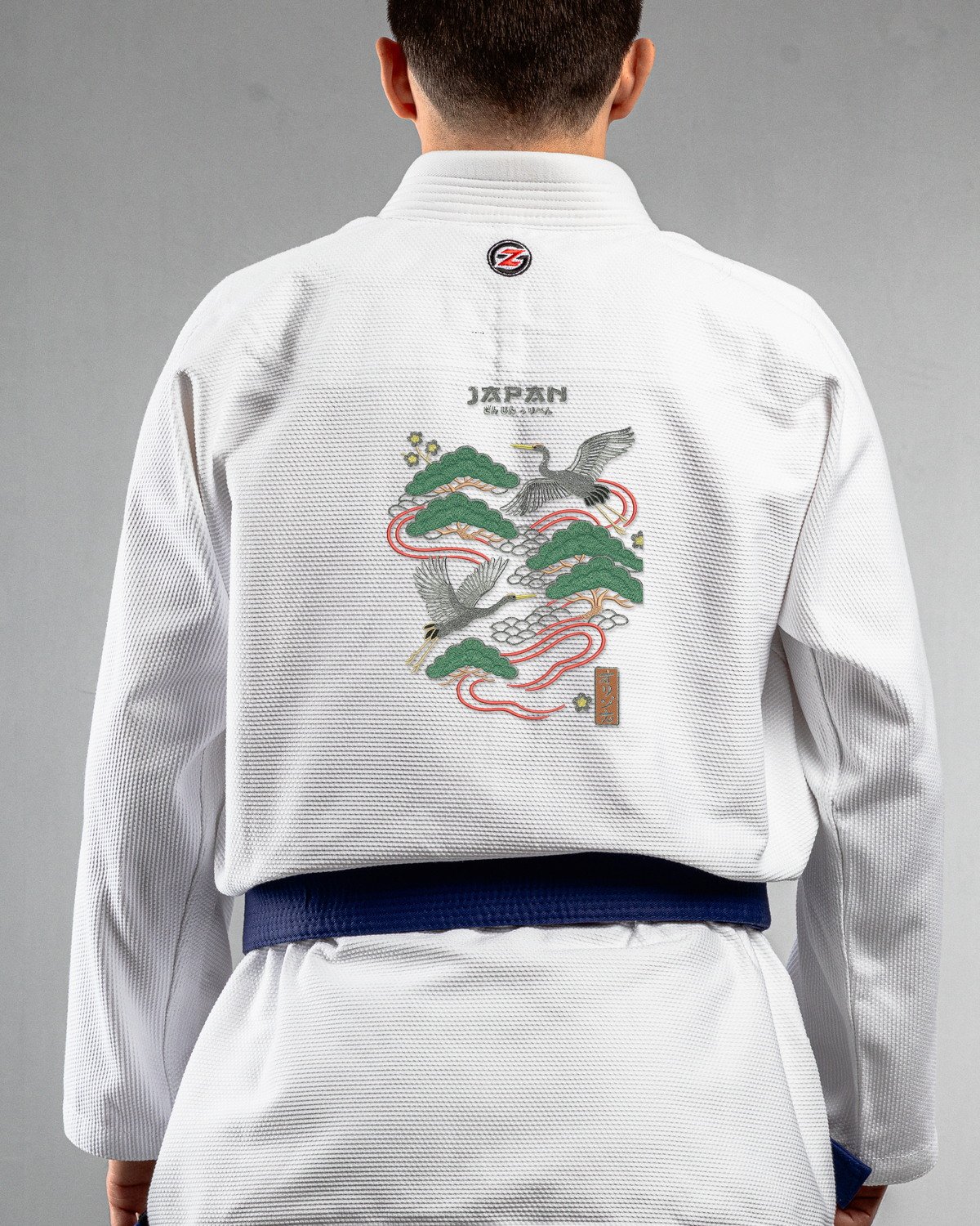 Japan white Gi back mockup Japan embroidery on the back of a white BJJ Gi