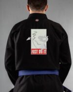 Just Do It embroidery on the back of a black BJJ Gi