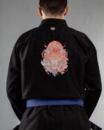 Lion embroidery on the back of a black BJJ Gi