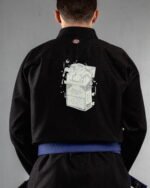 Lost Pack embroidery on the back of a black BJJ Gi