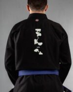 My Love Language embroidery on the back of a black BJJ Gi