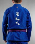 My Love Language embroidery on the back of a blue BJJ Gi