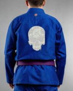 Macabre Chaos embroidery on the back of a blue BJJ Gi