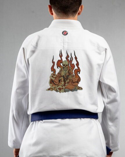 Meditate embroidery on the back of a white BJJ Gi