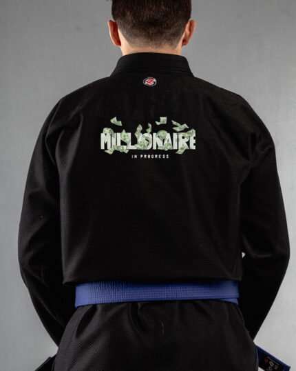 Millionaire In Progree embroidery on the back of a black BJJ Gi