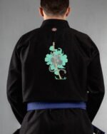 Monkey King embroidery on the back of a black BJJ Gi