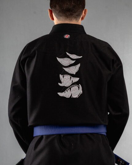 Monster Mouth embroidery on the back of a black BJJ Gi