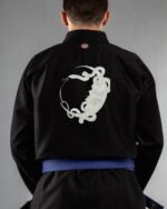 Dark Moon Serpent embroidery on the back of a black BJJ Gi