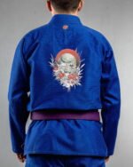 Moonlight Skull ,skulls & Flowers embroidery on the back of a blue BJJ Gi