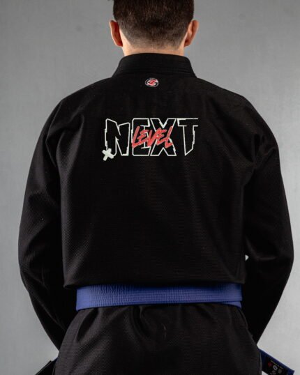 Next Level embroidery on the back of a black BJJ Gi