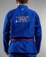 Next Level embroidery on the back of a blue BJJ Gi
