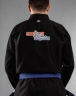Cosmic Orca embroidery on the back of a black BJJ Gi