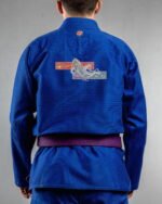 Cosmic Orca embroidery on the back of a blue BJJ Gi