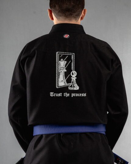 Trust The Process Chess Minimal Design embroidery on the back of a black BJJ Gi