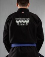 Tell Your Cat I Said Pspsps!! embroidery on the back of a black BJJ Gi