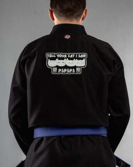 Tell Your Cat I Said Pspsps!! embroidery on the back of a black BJJ Gi