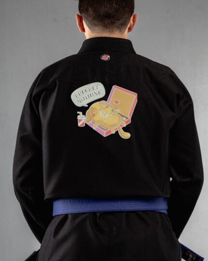 Regret Nothing embroidery on the back of a black BJJ Gi