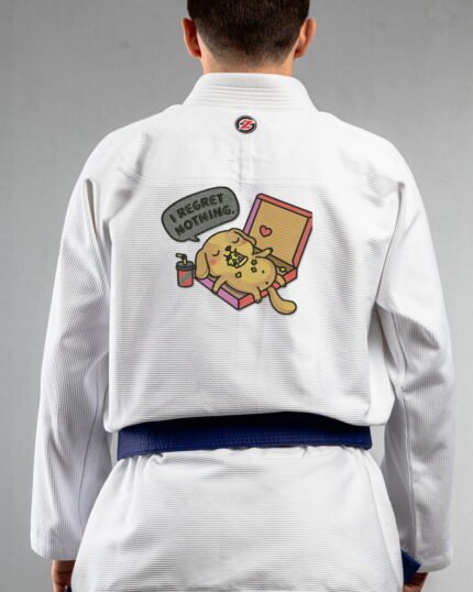 Regret Nothing embroidery on the back of a white BJJ Gi