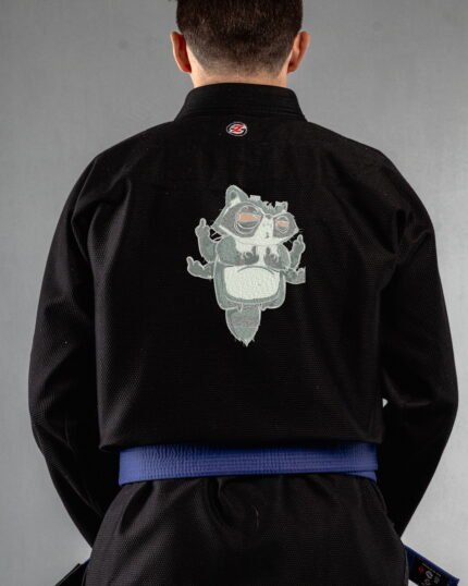 Rude Racoon embroidery on the back of a black BJJ Gi