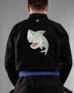 Shark embroidery on the back of a black BJJ Gi
