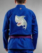 Shark embroidery on the back of a blue BJJ Gi