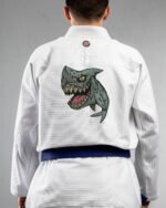Shark embroidery on the back of a white BJJ Gi