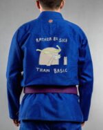 Sick Than Basic embroidery on the back of a blue BJJ Gi