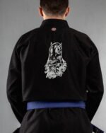 Sinner embroidery on the back of a black BJJ Gi