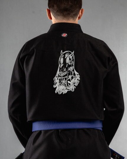 Sinner embroidery on the back of a black BJJ Gi