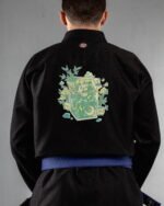 Sippin On Bamboo embroidery on the back of a black BJJ Gi