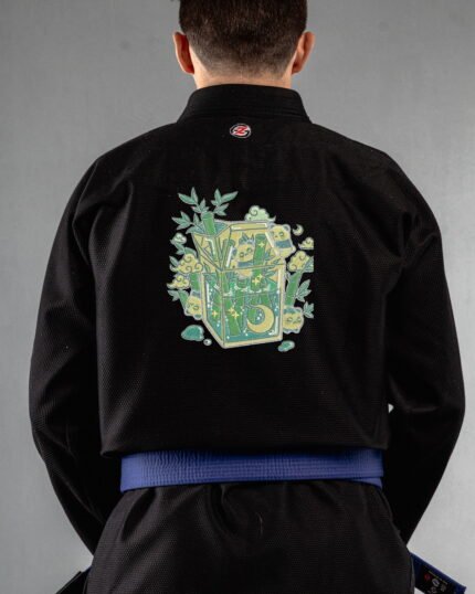 Sippin On Bamboo embroidery on the back of a black BJJ Gi