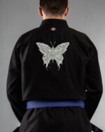 Skull Butterfly embroidery on the back of a black BJJ Gi
