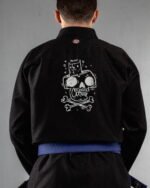 Meow Or Die embroidery on the back of a black BJJ Gi