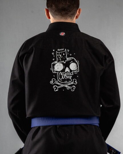 Meow Or Die embroidery on the back of a black BJJ Gi