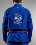 Meow Or Die embroidery on the back of a blue BJJ Gi