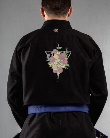 Skulls & Roses embroidery on the back of a black BJJ Gi