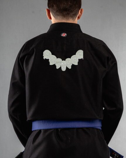 Skulls embroidery on the back of a black BJJ Gi
