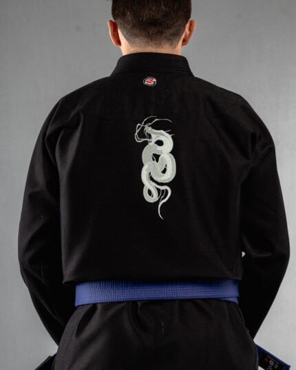 Snake Fangs embroidery on the back of a black BJJ Gi