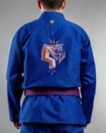 Snake embroidery on the back of a blue BJJ Gi