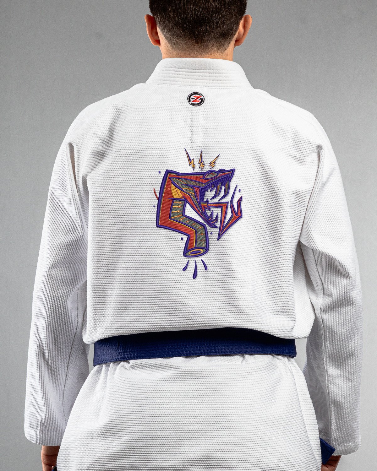 Snake white Gi back mockup Snake embroidery on the back of a white BJJ Gi