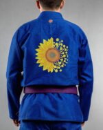 Sunflower embroidery on the back of a blue BJJ Gi