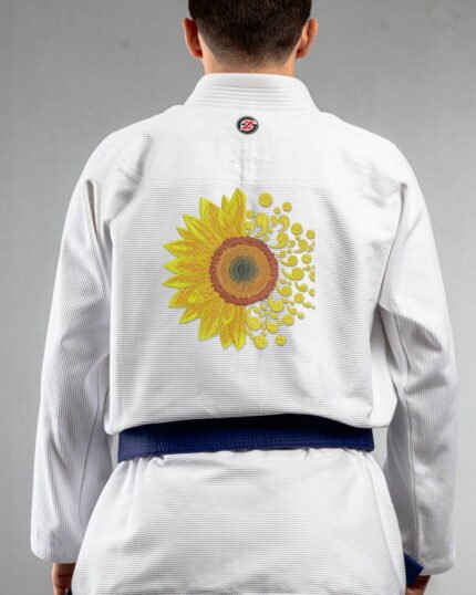 Sunflower embroidery on the back of a white BJJ Gi