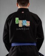 Long Story Short I Survived embroidery on the back of a black BJJ Gi