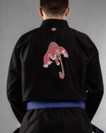 Tiger Claws embroidery on the back of a black BJJ Gi