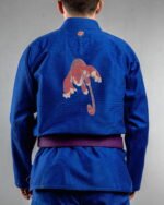 Tiger Claws embroidery on the back of a blue BJJ Gi