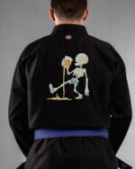 Tipsy embroidery on the back of a black BJJ Gi