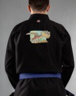 Trex embroidery on the back of a black BJJ Gi